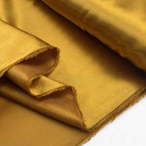 polyester_satin_dress_fabric_lumos_lining_gold_fold